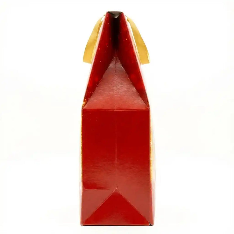 Inhoud van het Bauli Tanti Auguri-pakket inclusief pandoro, Italiaanse mousserende wijn en assortiment zoetigheden