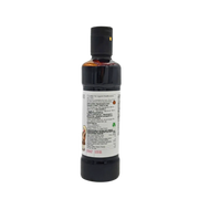 Côté opposé de la bouteille de crème de vinaigre balsamique de Modène I.G.P. à la truffe blanche Carandini 250ml, avec les informations sur le fabricant et les conseils de conservation.